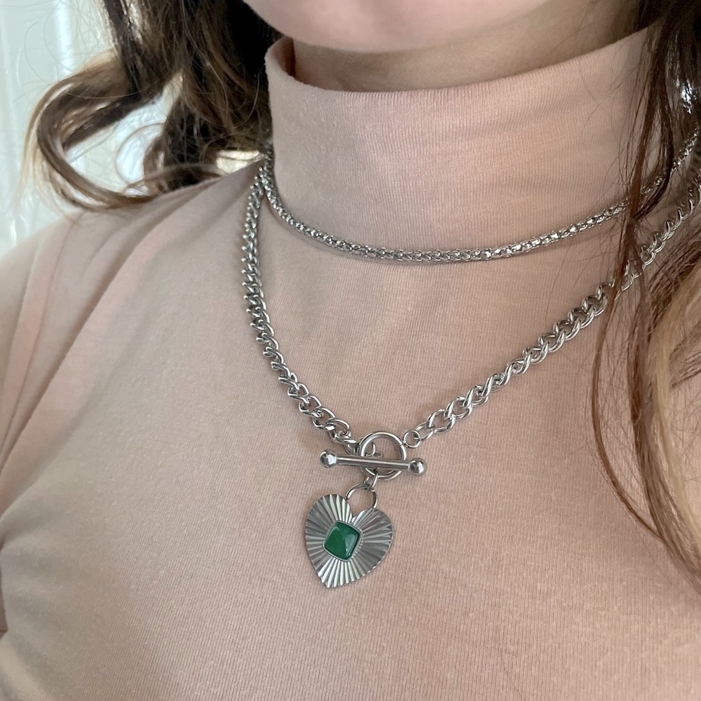 Hypoallergenic Jewelry: never worn stainless steel necklace with a green stone.
